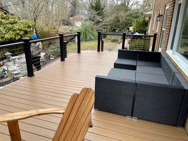 Deck enclosure with cable rail