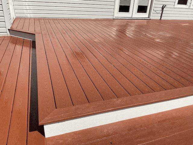 Wolf Wolf Redwood composite deck installed by American Composite Deck Pros