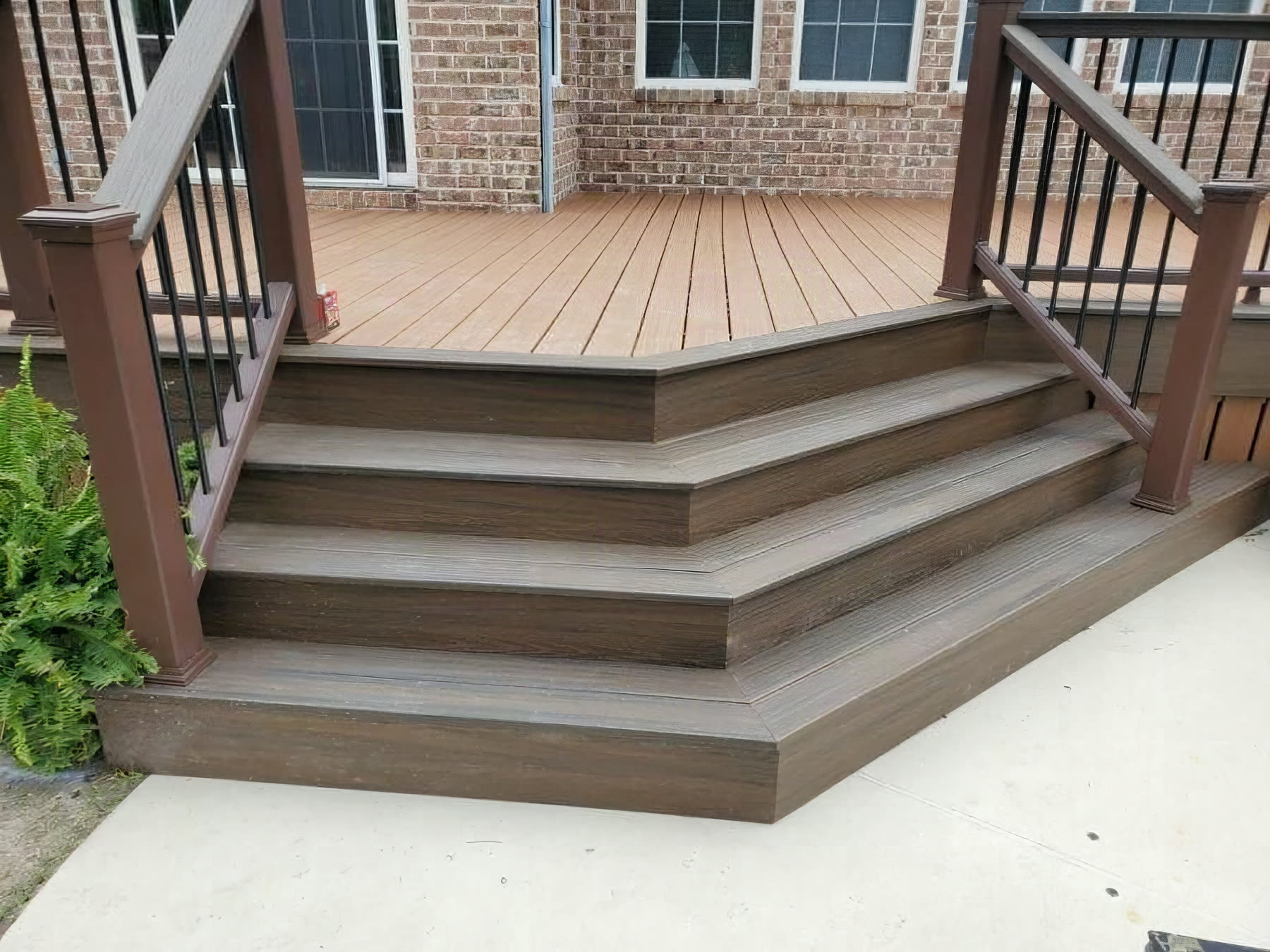 Trex Tiki Torch composite deck installed by American Composite Deck Pros